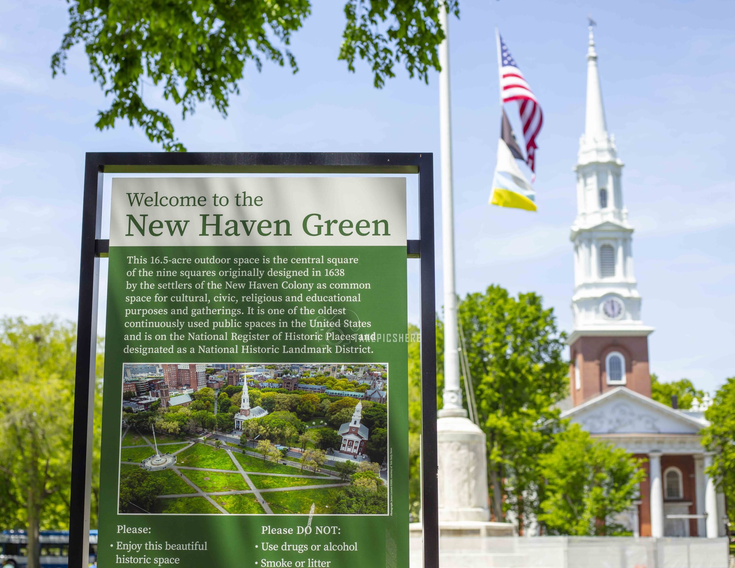 Welcome to New Haven Sign with Church in BG. Photo Taken by Lance Long of LongShots Media